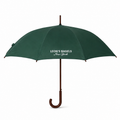 A dark green open umbrella with a brown wooden handle and shaft, featuring the white printed text 'LEON'S BAGELS New York' on the canopy, set against a plain white background.